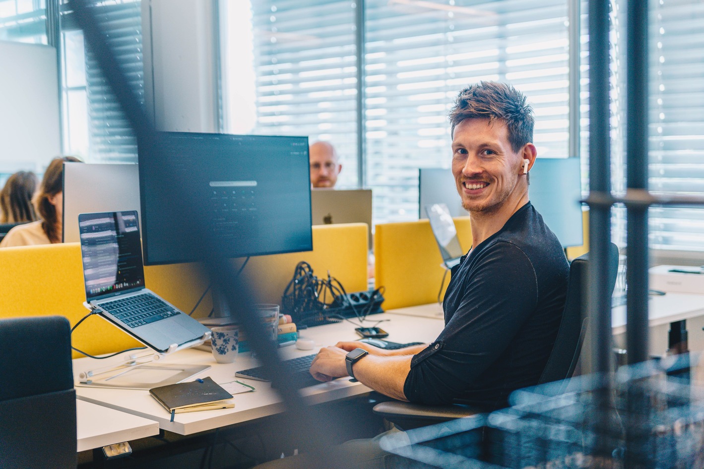 Customer Service colleague behind computer